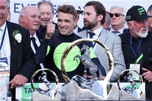 Jockey Sam Clipperton (C), rider of Australian sprinter Think About It, celebrates victory in The TAB Everest during Sydney Racing at Royal Randwick Racecourse on October 14, 2023 in Sydney, Australia. (Getty)