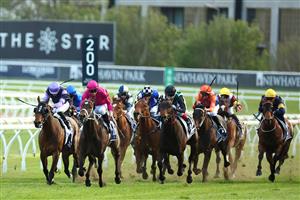 SYDNEY, AUSTRALIA - OCTOBER 14: James Mcdonald riding Fangirl  wins Race 9 King Charles III Stakes during Sydney Racing - TAB Everest Day at Royal Randwick Racecourse on October 14, 2023 in Sydney, Australia. (Photo by Jeremy Ng/Getty Images)