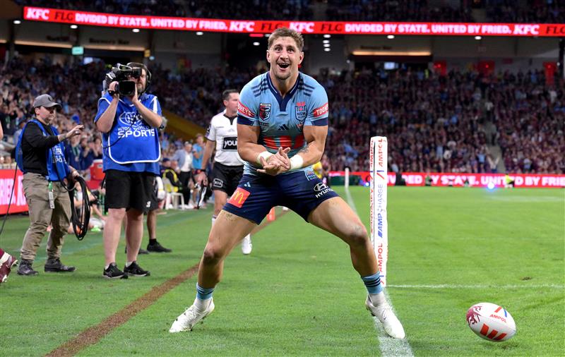 BRISBANE, AUSTRALIA - MAY 28: Zac Lomax of the Blues celebrates after scoring a try during game one of the Men