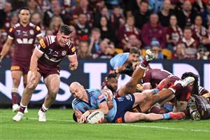 BRISBANE, AUSTRALIA - MAY 28: Dylan Edwards of the Blues scores a try during game one of the Men