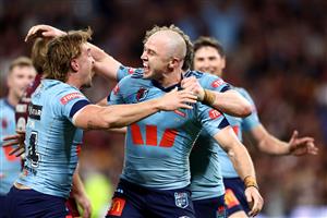 BRISBANE, AUSTRALIA - MAY 28: Dylan Edwards of the Blues celebrates after scoring a try during game one of the Men