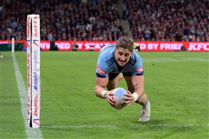 BRISBANE, AUSTRALIA - MAY 28: Zac Lomax of the Blues scores a try during game one of the Men