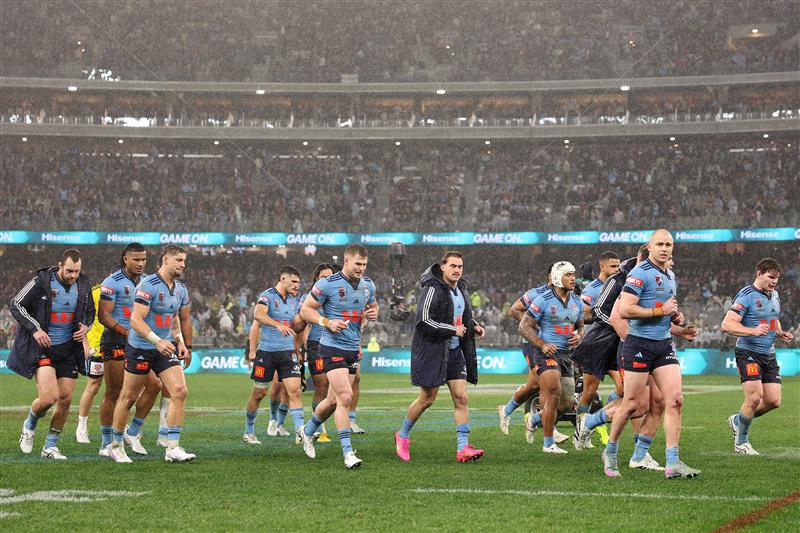 PERTH, AUSTRALIA - JUNE 18: The Blues run off the field at half-time during game two of the Men