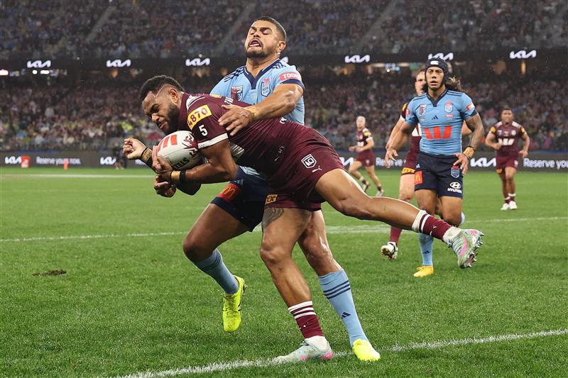 PERTH, AUSTRALIA - JUNE 18: Hamiso Tabuai-Fidow of the Maroons scores his second try during game two of the Men