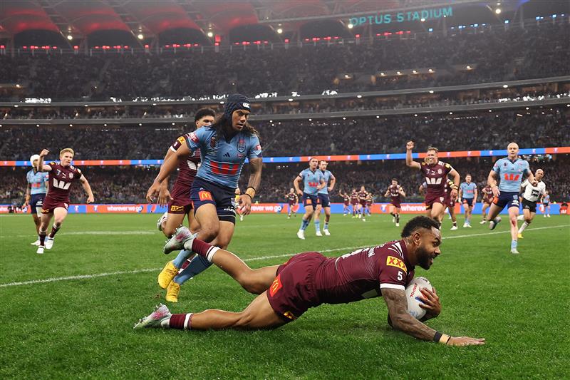 PERTH, AUSTRALIA - JUNE 18: Hamiso Tabuai-Fidow of the Maroons scores a try during game two of the Men