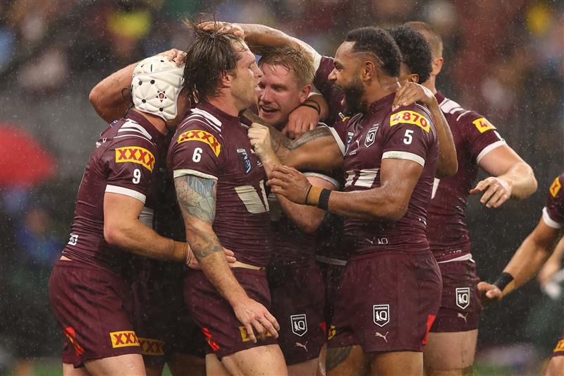 PERTH, AUSTRALIA - JUNE 18: Cameron Munster of the Maroons celebrates scoring a try during game two of the Men
