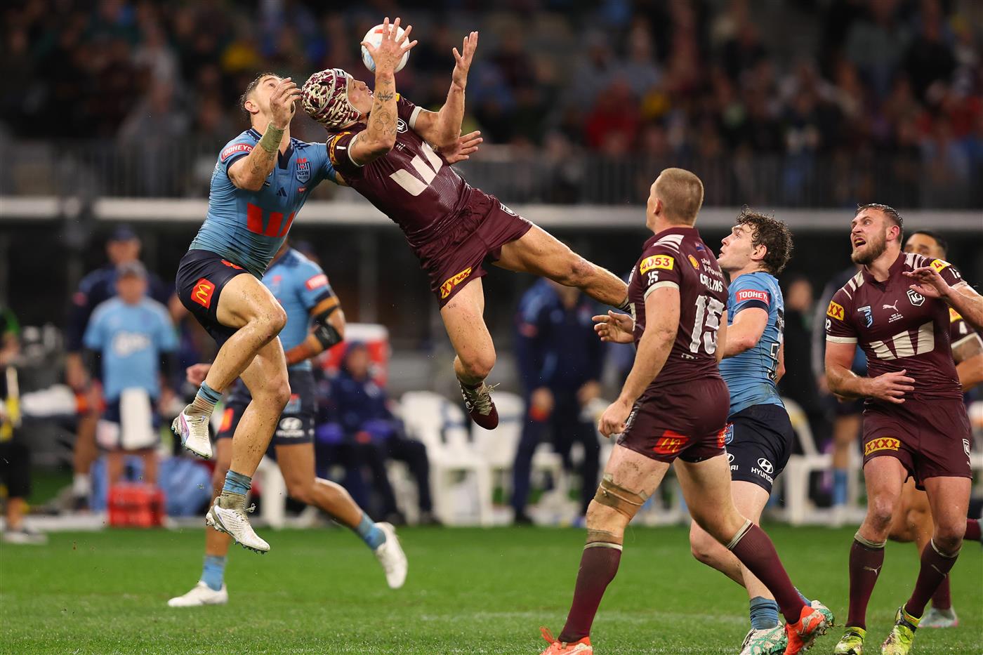 PERTH, AUSTRALIA - JUNE 18: Kalyn Ponga of the Maroons and Zac Lomax of the Blues compete for the ball during game two of the Men