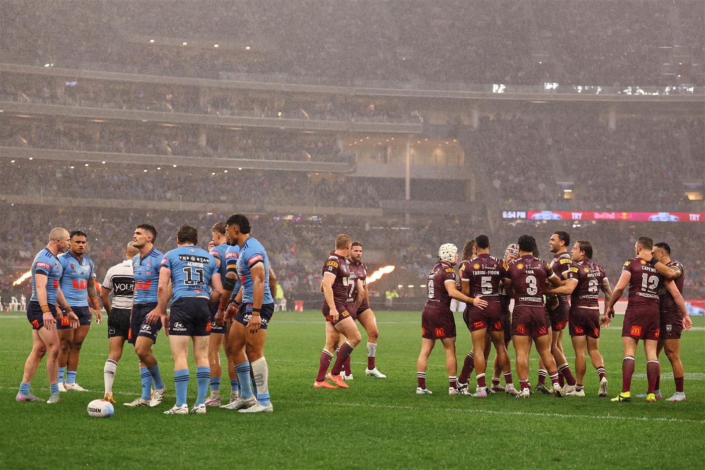 PERTH, AUSTRALIA - JUNE 18: Kurt Capewell of the Maroons celebrates scoring a try with teammates during game two of the Men