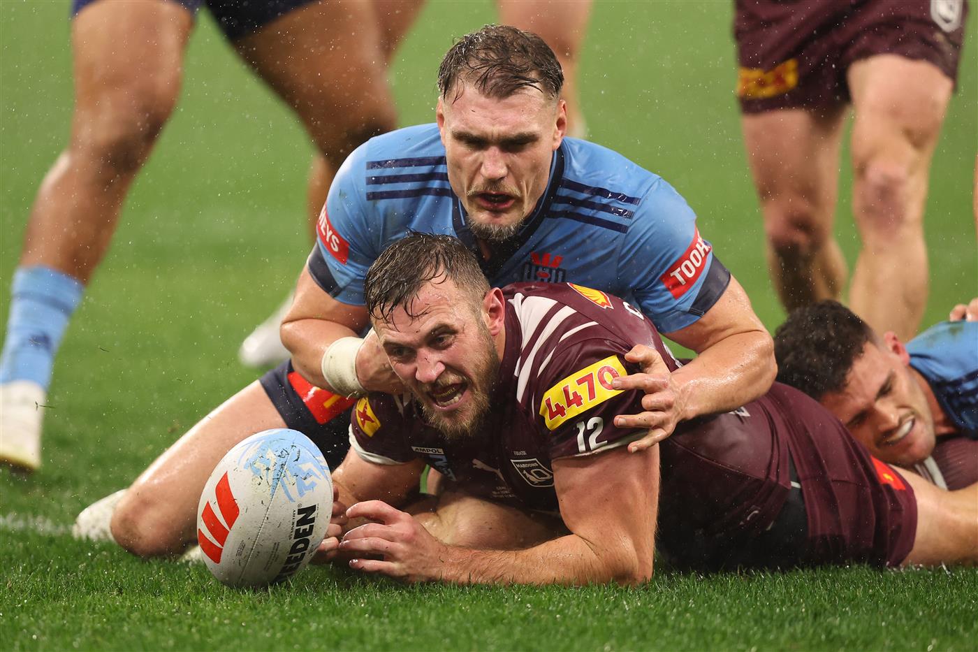 PERTH, AUSTRALIA - JUNE 18: Kurt Capewell of the Maroons scores a try during game two of the Men