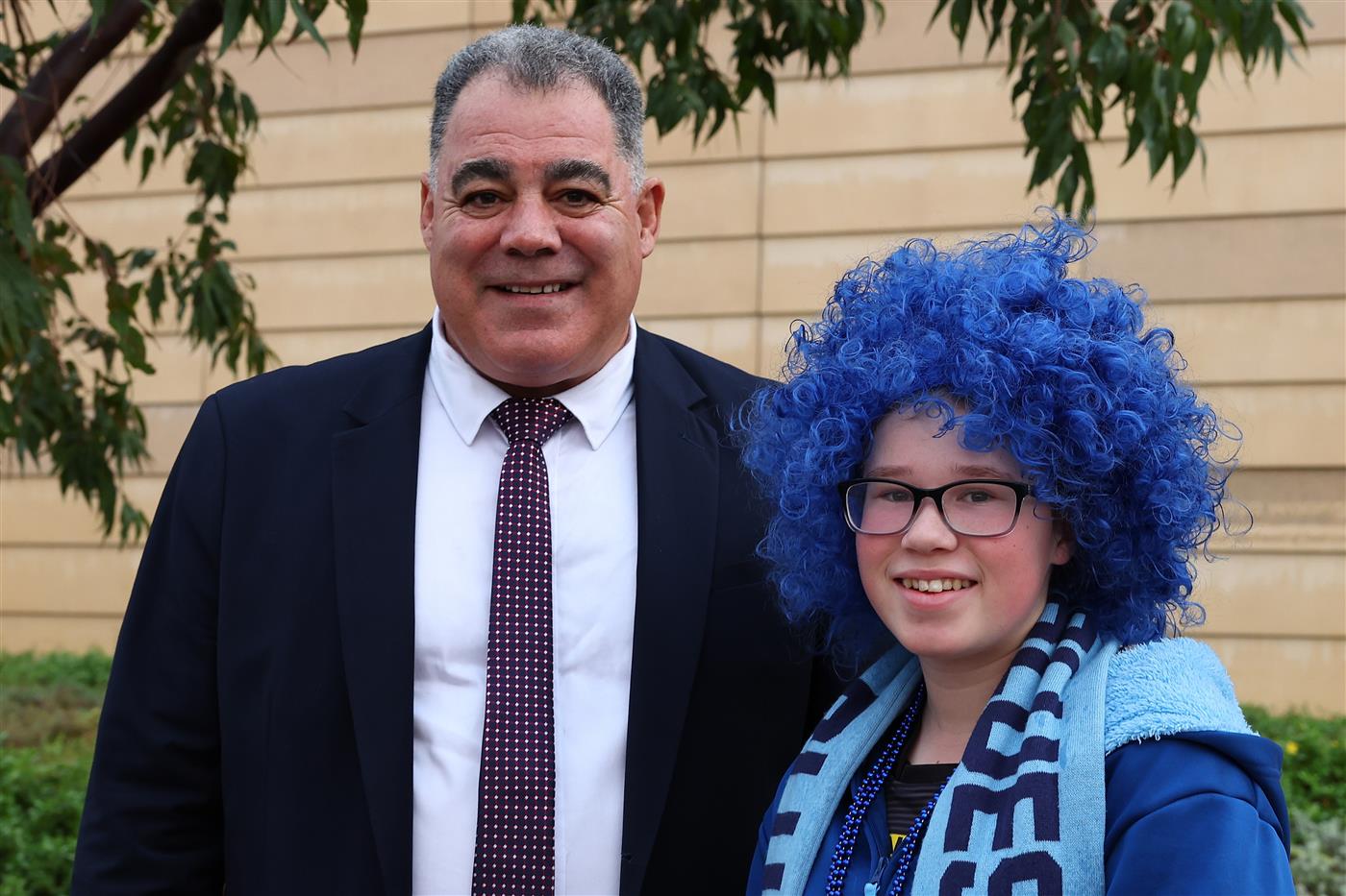 PERTH, AUSTRALIA - JUNE 18: Mal Meninga poses with a Blues fan before game two of the Men