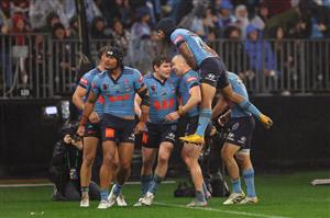 PERTH, AUSTRALIA - JUNE 18: Stephen Crichton of the Blues celebrates scoring a try with teammates during game two of the Men