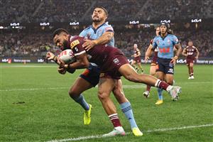 PERTH, AUSTRALIA - JUNE 18: Hamiso Tabuai-Fidow of the Maroons scores his second try during game two of the Men