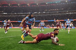 PERTH, AUSTRALIA - JUNE 18: Hamiso Tabuai-Fidow of the Maroons scores a try during game two of the Men