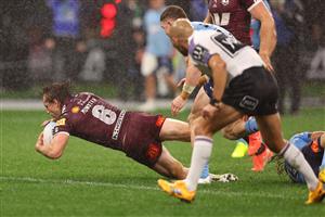 PERTH, AUSTRALIA - JUNE 18: Cameron Munster of the Maroons scores a try during game two of the Men