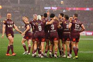 PERTH, AUSTRALIA - JUNE 18: Kurt Capewell of the Maroons celebrates scoring a try with teammates during game two of the Men