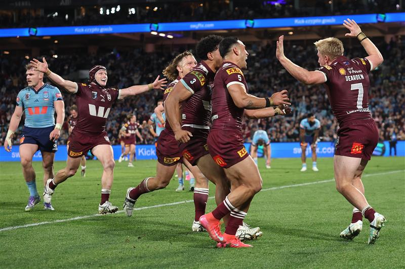 SYDNEY, AUSTRALIA - JULY 09: Tom Dearden of the Maroons celebrates a try during game three of the Men