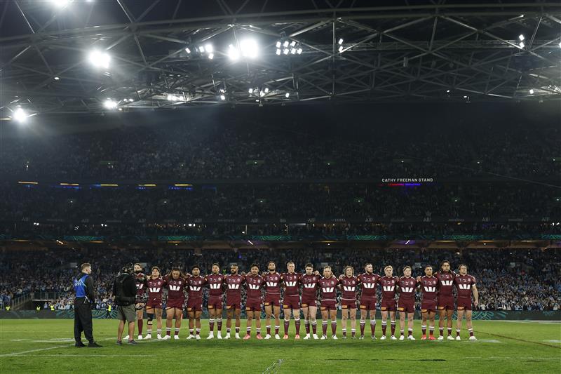 SYDNEY, AUSTRALIA - JULY 09: Queensland players line up for the national anthem ahead of game three of the Men