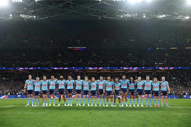 SYDNEY, AUSTRALIA - JULY 09:  New South Wales Blues during the National anthem ahead of game three of the Men