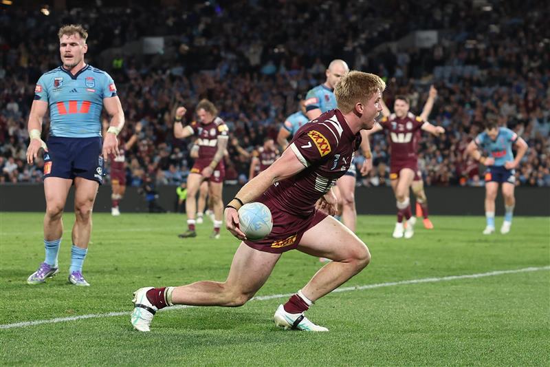 SYDNEY, AUSTRALIA - JULY 09: Tom Dearden of the Maroons celebrates a try during game three of the Men