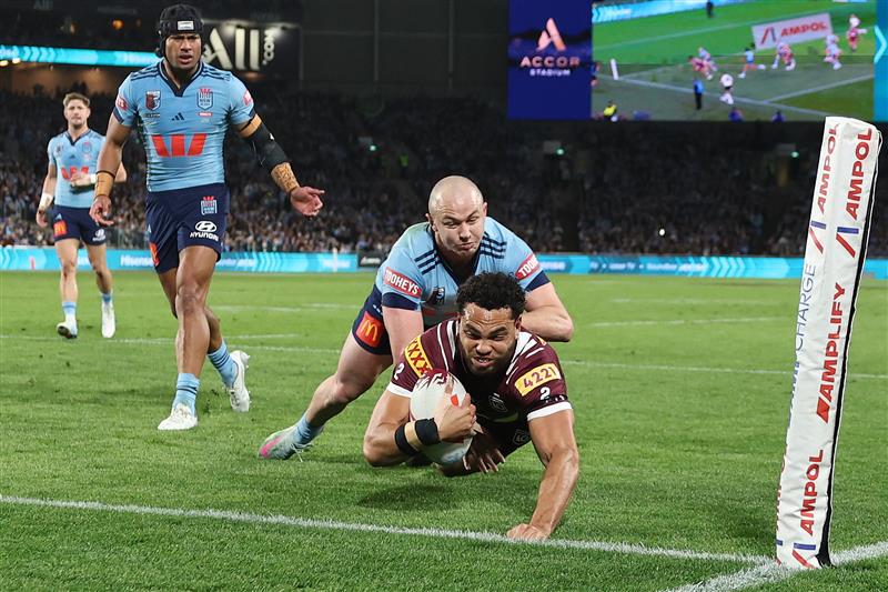SYDNEY, AUSTRALIA - JULY 09: Xavier Coates of the Maroons  scores a try during game three of the Men