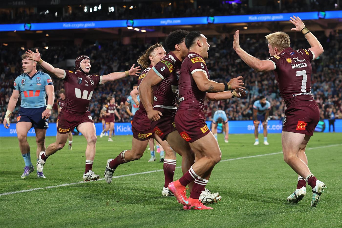SYDNEY, AUSTRALIA - JULY 09: Tom Dearden of the Maroons celebrates a try during game three of the Men