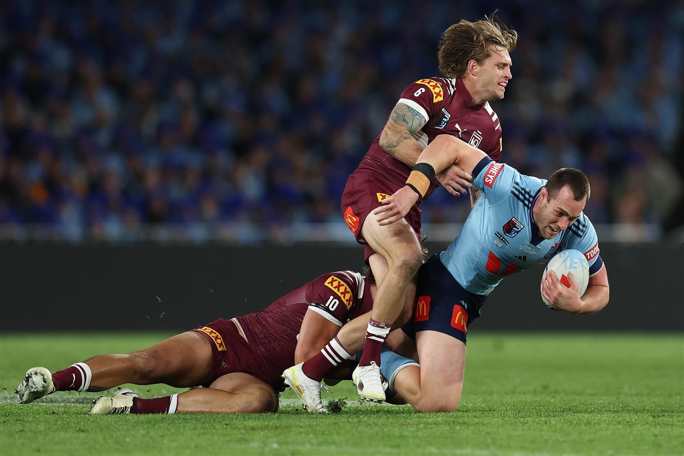 SYDNEY, AUSTRALIA - JULY 09: Isaah Yeo of the Blues is tackled during game three of the Men