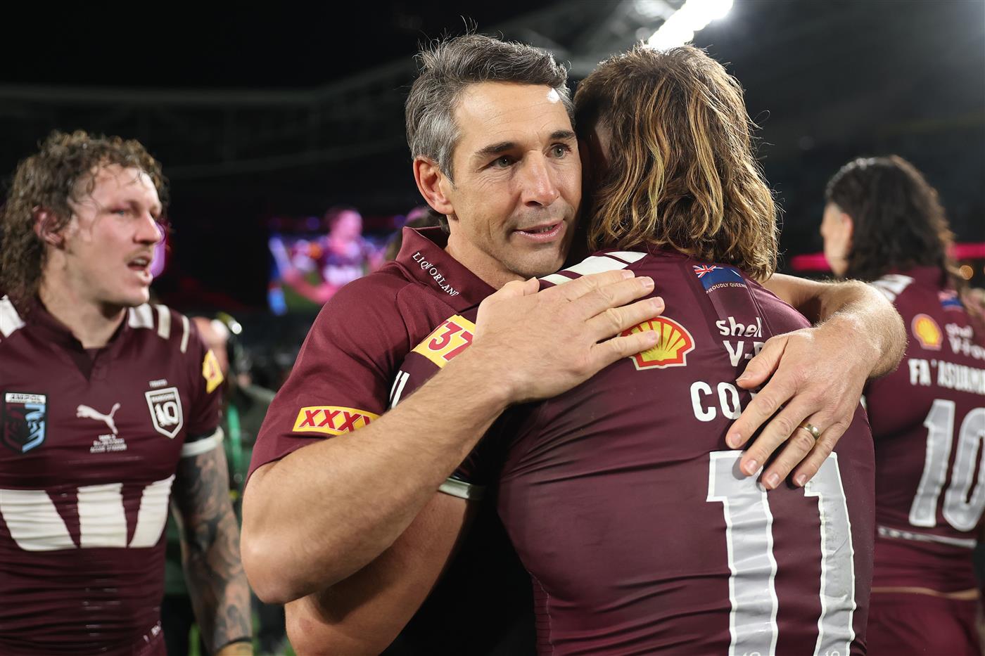 SYDNEY, AUSTRALIA - JULY 09: Billy Slater, Maroons head coach celebrates winning with Reuben Cotter after game three of the Men