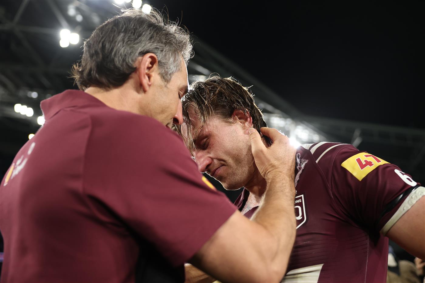 SYDNEY, AUSTRALIA - JULY 09: Billy Slater, Maroons head coach celebrates winning with captain Cameron Munster after game three of the Men