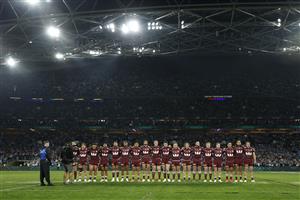 SYDNEY, AUSTRALIA - JULY 09: Queensland players line up for the national anthem ahead of game three of the Men