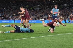 SYDNEY, AUSTRALIA - JULY 09: Tom Dearden of the Maroons scores a try during game three of the Men
