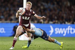 SYDNEY, AUSTRALIA - JULY 09: Tom Dearden of the Maroons is tackled during game three of the Men