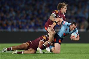 SYDNEY, AUSTRALIA - JULY 09: Isaah Yeo of the Blues is tackled during game three of the Men