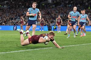 SYDNEY, AUSTRALIA - JULY 09: Tom Dearden of the Maroons scores a try during game three of the Men