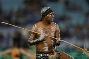 SYDNEY, AUSTRALIA - JULY 09: An Indigenous dancer performs ahead of game three of the Men