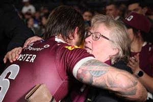SYDNEY, AUSTRALIA - JULY 09: Cameron Munster of the Maroons and his mother Deborah embrace looks on during game three of the Men