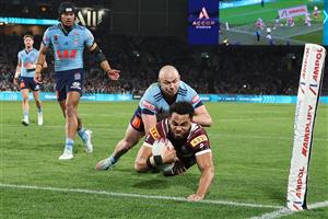 SYDNEY, AUSTRALIA - JULY 09: Xavier Coates of the Maroons scores a try during game three of the Men