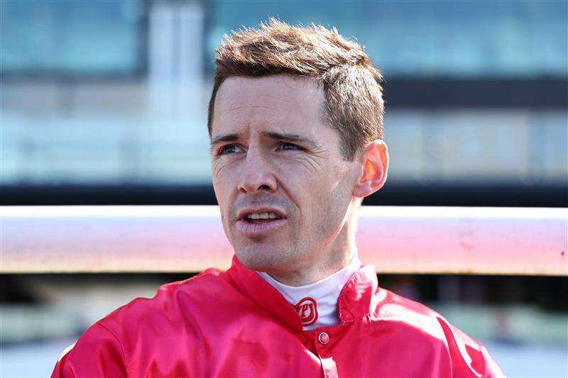SYDNEY, AUSTRALIA - AUGUST 23: Jason Collett riding  Signor Tortoni win Race 1 Midway during Sydney Racing at Royal Randwick Racecourse on August 23, 2025 in Sydney, Australia. (Photo by Jeremy Ng/Getty Images)