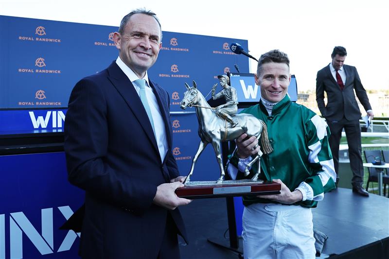 SYDNEY, AUSTRALIA - AUGUST 23: Trainer Chris Waller celebrates after James McDonald riding  Via Sistina win Race 8 Winx Stakes during Sydney Racing at Royal Randwick Racecourse on August 23, 2025 in Sydney, Australia. (Photo by Jeremy Ng/Getty Images)