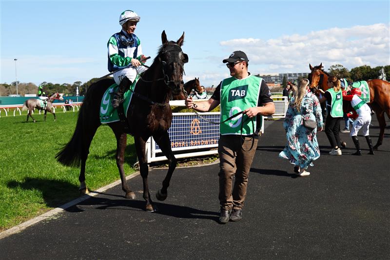 SYDNEY, AUSTRALIA - AUGUST 23: Tim Clark riding Wuddzz win Race 3 Gold Coast Turf Club Trophy during Sydney Racing at Royal Randwick Racecourse on August 23, 2025 in Sydney, Australia. (Photo by Jeremy Ng/Getty Images)