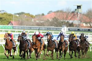 SYDNEY, AUSTRALIA - AUGUST 23: Jason Collett riding  Signor Tortoni win Race 1 Midway during Sydney Racing at Royal Randwick Racecourse on August 23, 2025 in Sydney, Australia. (Photo by Jeremy Ng/Getty Images)
