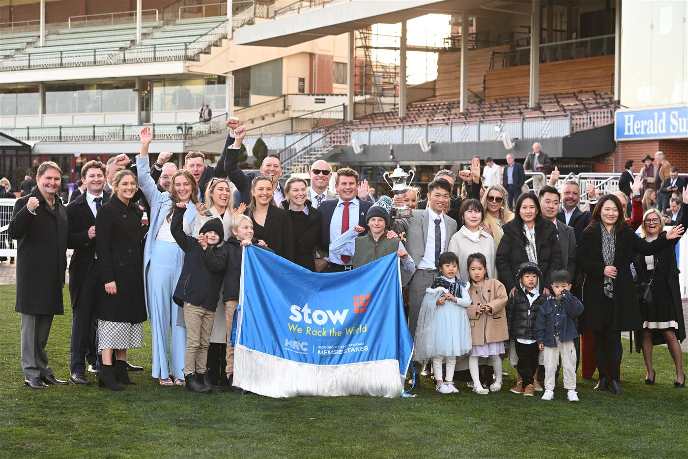 MELBOURNE, AUSTRALIA - AUGUST 30: Winning connections celebrate Treasurethe Moment winning Race 9, the Stow Storage Memsie Stakes during Melbourne Racing at Caulfield Racecourse on August 30, 2025 in Melbourne, Australia. (Photo by Vince Caligiuri/Getty Images)