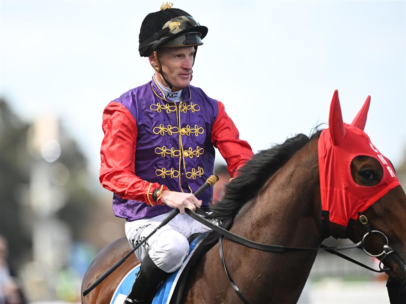 MELBOURNE, AUSTRALIA - AUGUST 30: Mark Zahra is seen riding Gilded Water in the royal colours in Race 1, the Sportsbet Get On Now Handicap  during Melbourne Racing at Caulfield Racecourse on August 30, 2025 in Melbourne, Australia. (Photo by Vince Caligiuri/Getty Images)