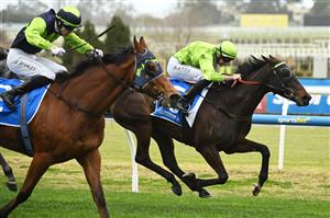 MELBOURNE, AUSTRALIA - AUGUST 30: Declan Bates riding Too Darn Discreet defeats Jet Stanley riding El Rocko in Race 5, the Remembering Mikaela Claridge during Melbourne Racing at Caulfield Racecourse on August 30, 2025 in Melbourne, Australia. (Photo by Vince Caligiuri/Getty Images)