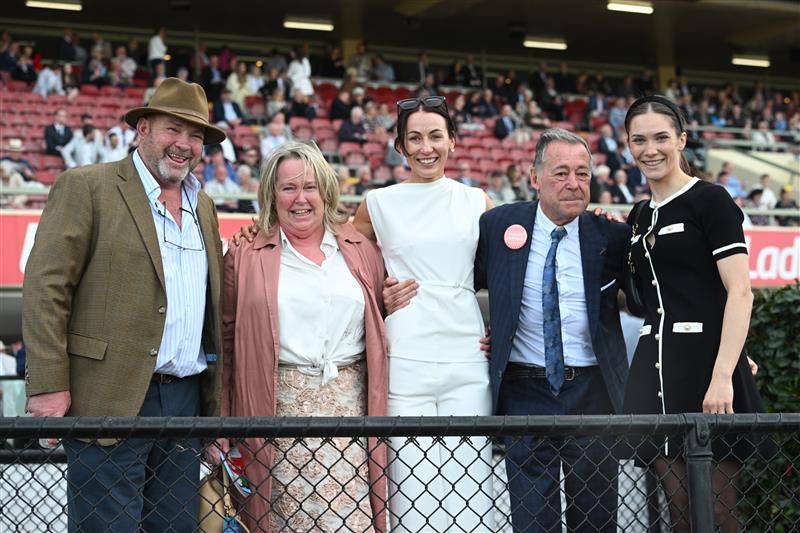 MELBOURNE, AUSTRALIA - SEPTEMBER 06: Trainers Peter Moody and Katherine Coleman pose with connections after Desert Lightning won Race 8, the Ranvet So You Think Stakes during Melbourne Racing at Moonee Valley Racecourse on September 06, 2025 in Melbourne, Australia. (Photo by Vince Caligiuri/Getty Images)