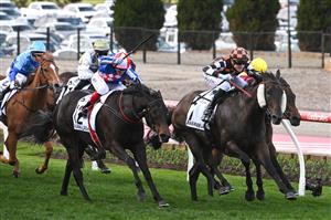 MELBOURNE, AUSTRALIA - SEPTEMBER 06: Ben Allen riding Baraqiel defeats Craig Williams riding Alabama Lass in Race 9, the Charter Keck Cramer Moir Stakes  during Melbourne Racing at Moonee Valley Racecourse on September 06, 2025 in Melbourne, Australia. (Photo by Vince Caligiuri/Getty Images)