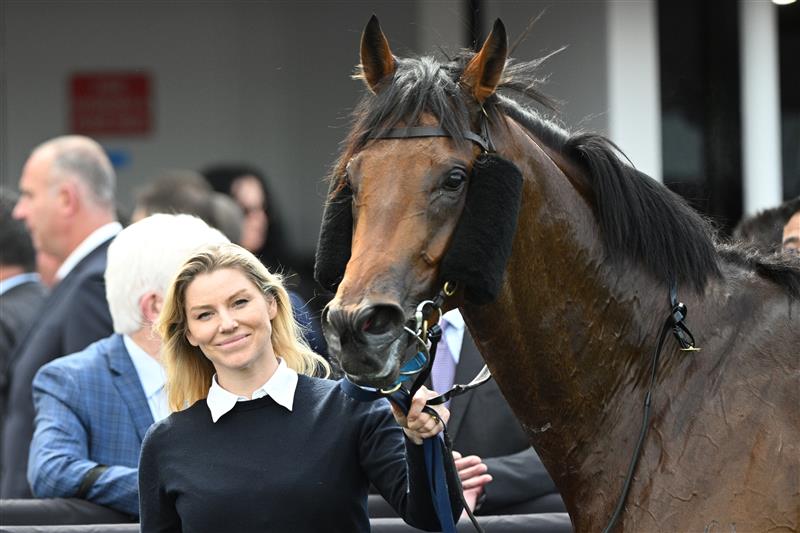 MELBOURNE, AUSTRALIA - SEPTEMBER 13: Kate Brideoake poses with Vinrock after winning Race 3, the Rubaroc Exford Plate during Melbourne Racing at Flemington Racecourse on September 13, 2025 in Melbourne, Australia. (Photo by Vince Caligiuri/Getty Images)
