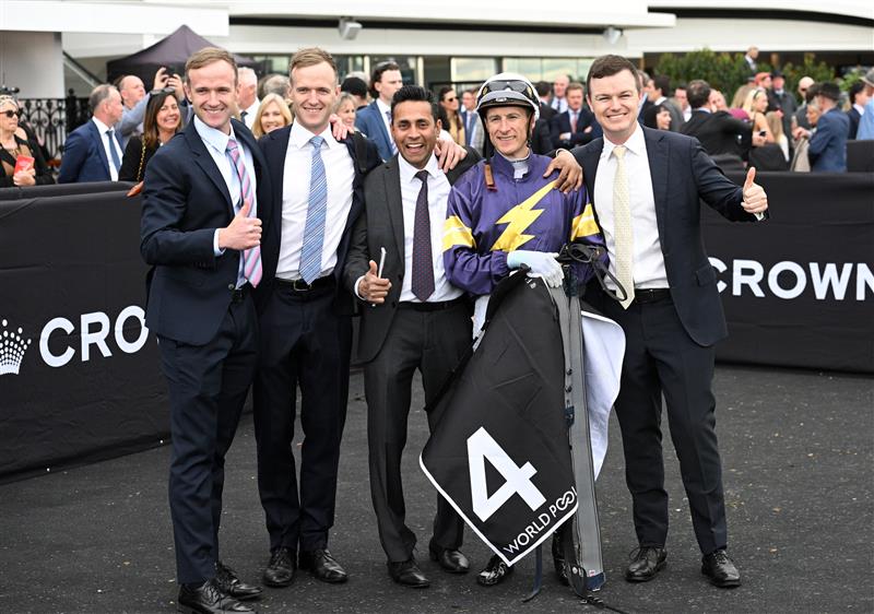 MELBOURNE, AUSTRALIA - SEPTEMBER 13: Blake Shinn poses with The Hayes team after riding Arkansaw Kid to win Race 6, the Hkjc World Pool Bobbie Lewis Quality during Melbourne Racing at Flemington Racecourse on September 13, 2025 in Melbourne, Australia. (Photo by Vince Caligiuri/Getty Images)