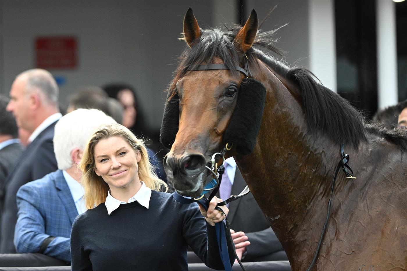 MELBOURNE, AUSTRALIA - SEPTEMBER 13: Kate Brideoake poses with Vinrock after winning Race 3, the Rubaroc Exford Plate during Melbourne Racing at Flemington Racecourse on September 13, 2025 in Melbourne, Australia. (Photo by Vince Caligiuri/Getty Images)
