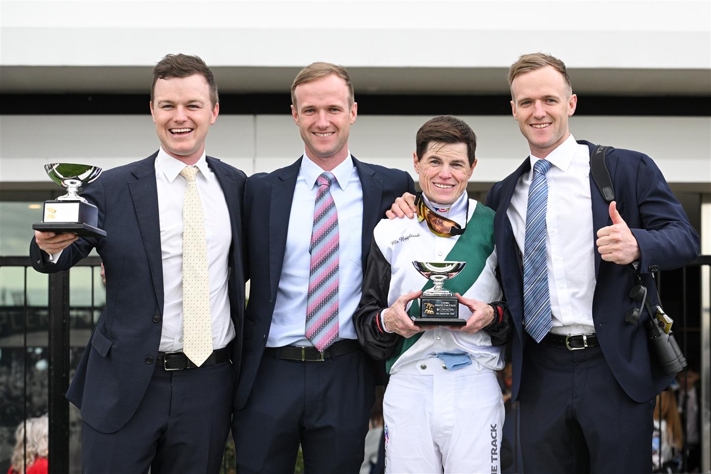MELBOURNE, AUSTRALIA - SEPTEMBER 13: Craig Williams poses with trophy with Co trainers Ben Hayes, JD Hayes and Will Hayes (r) after riding Mr Brightside to win Race 8, the Crown Makybe Diva Stakes during Melbourne Racing at Flemington Racecourse on September 13, 2025 in Melbourne, Australia. (Photo by Vince Caligiuri/Getty Images)