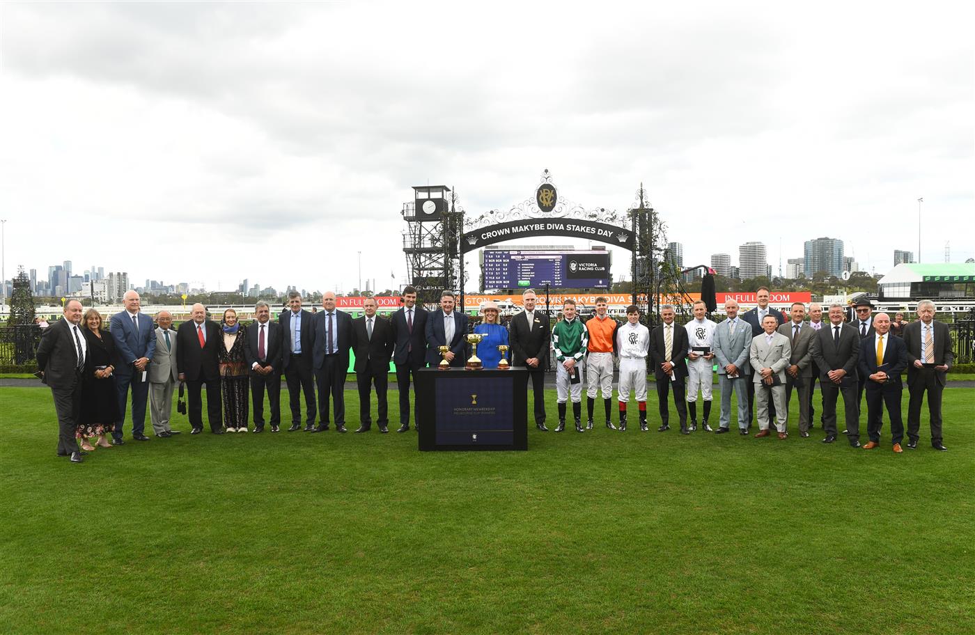 MELBOURNE, AUSTRALIA - SEPTEMBER 13: Neil Wilson, Chairman and Kylie Rogers (CEO) pose for a group photo after presenting Melbourne Cup winning trainers and jockeys with Life membership during Melbourne Racing at Flemington Racecourse on September 13, 2025 in Melbourne, Australia. (Photo by Vince Caligiuri/Getty Images)